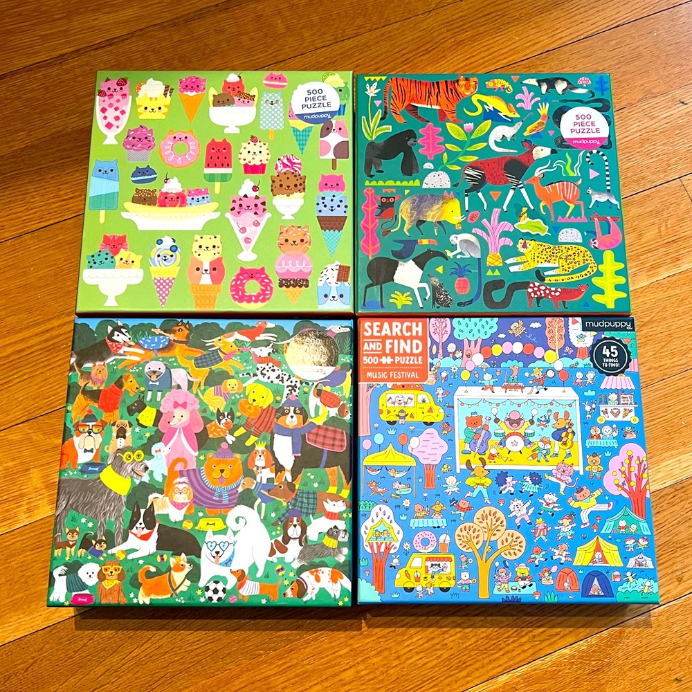 4 Mudpuppy 500 piece puzzles.